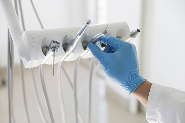 Professional Invisalign Clear Aligners technician working in Olmos Park, TX
